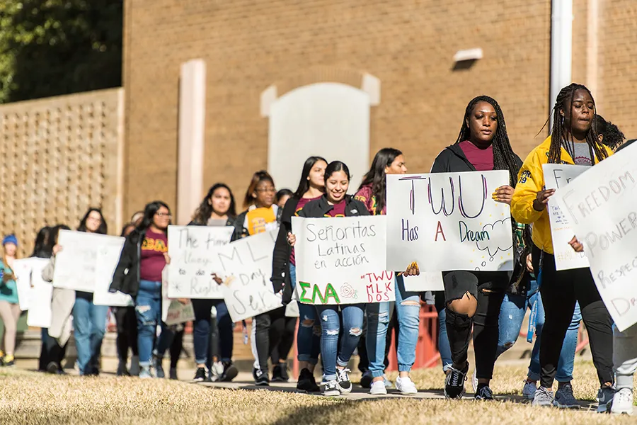 Students march from TWU to the Denton MLK, Jr. Rec Center during Martin Luther King, Jr. Day of Service in 2020