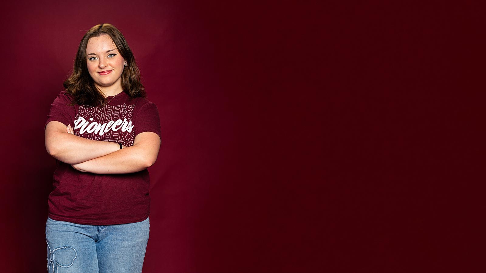 A TWU student wearing a Pioneers t-shirt
