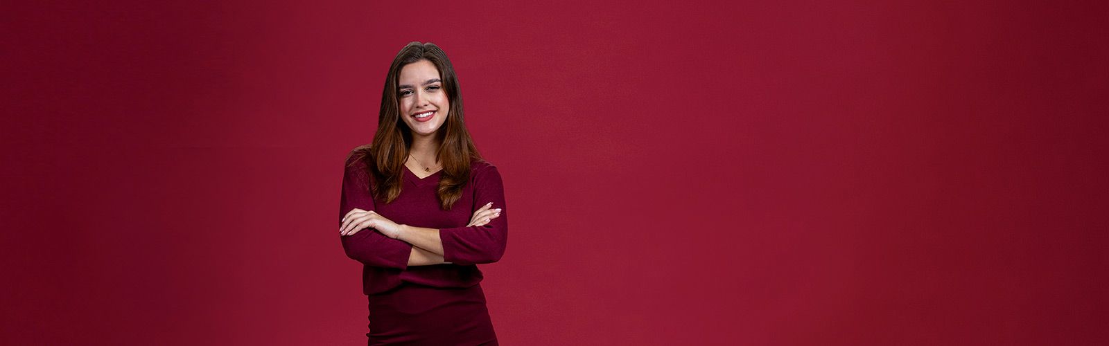 A TWU MAK College of Business major wearing a professional suit